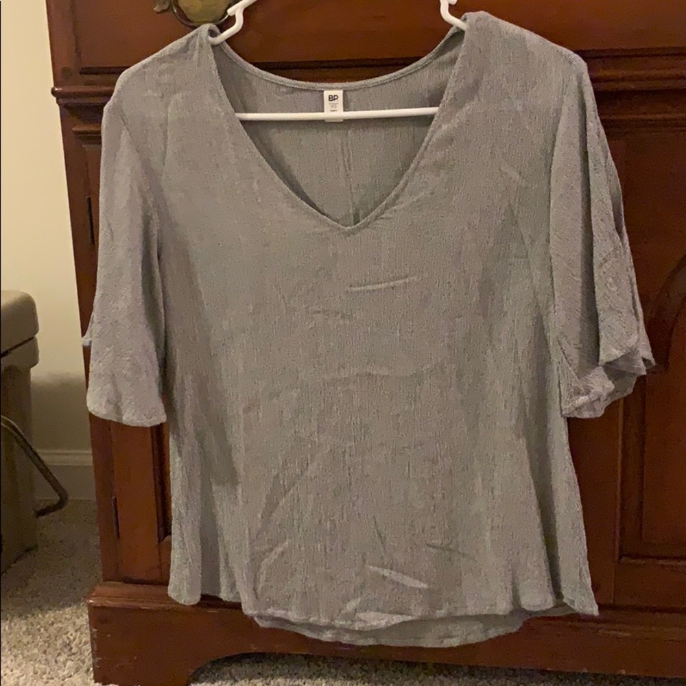 Woman’s short sleeve shirt.  Size XS.  Gently used